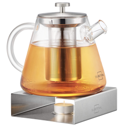 Teekanne aus Glas mit Stövchen